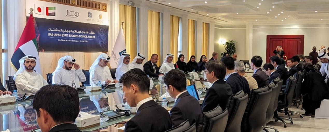 Business meeting with international clients discussing market entry strategies