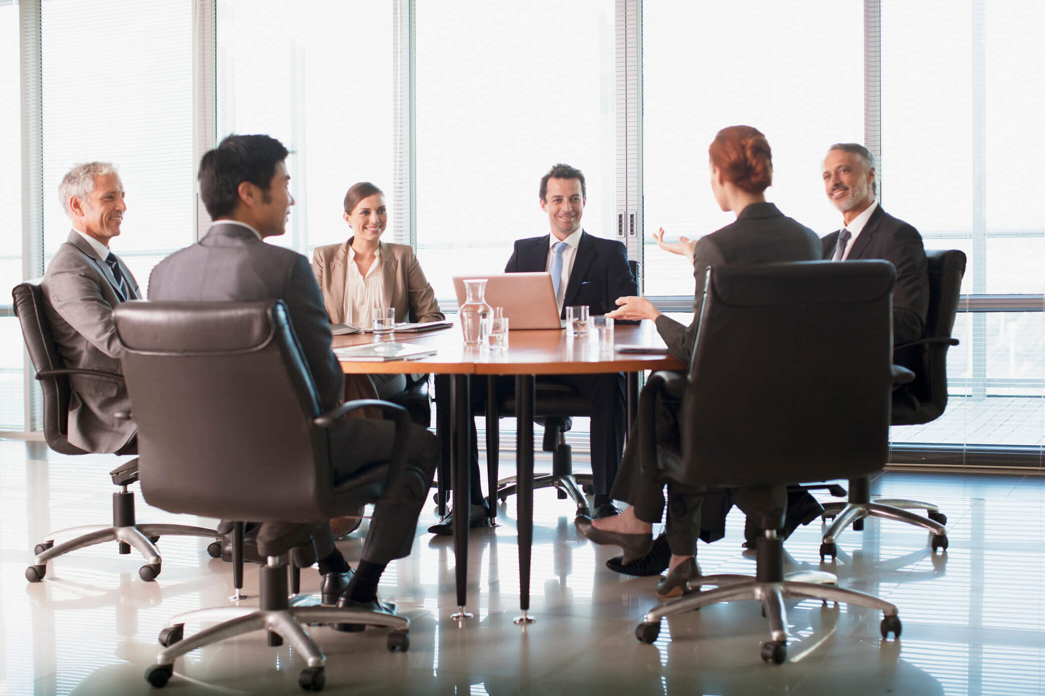 Consulting professionals engaging in strategic planning discussion